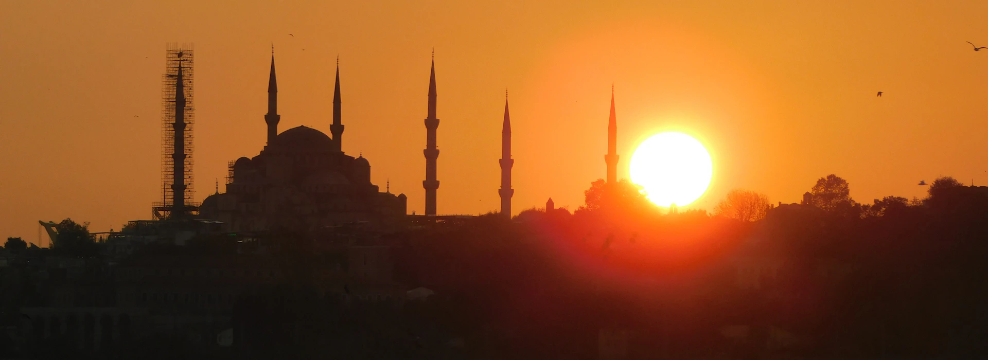 Mosque silhouette at golden hour